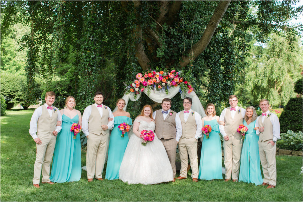 Bridal Party Teal Dresses Peony Bouquets Floral Arch