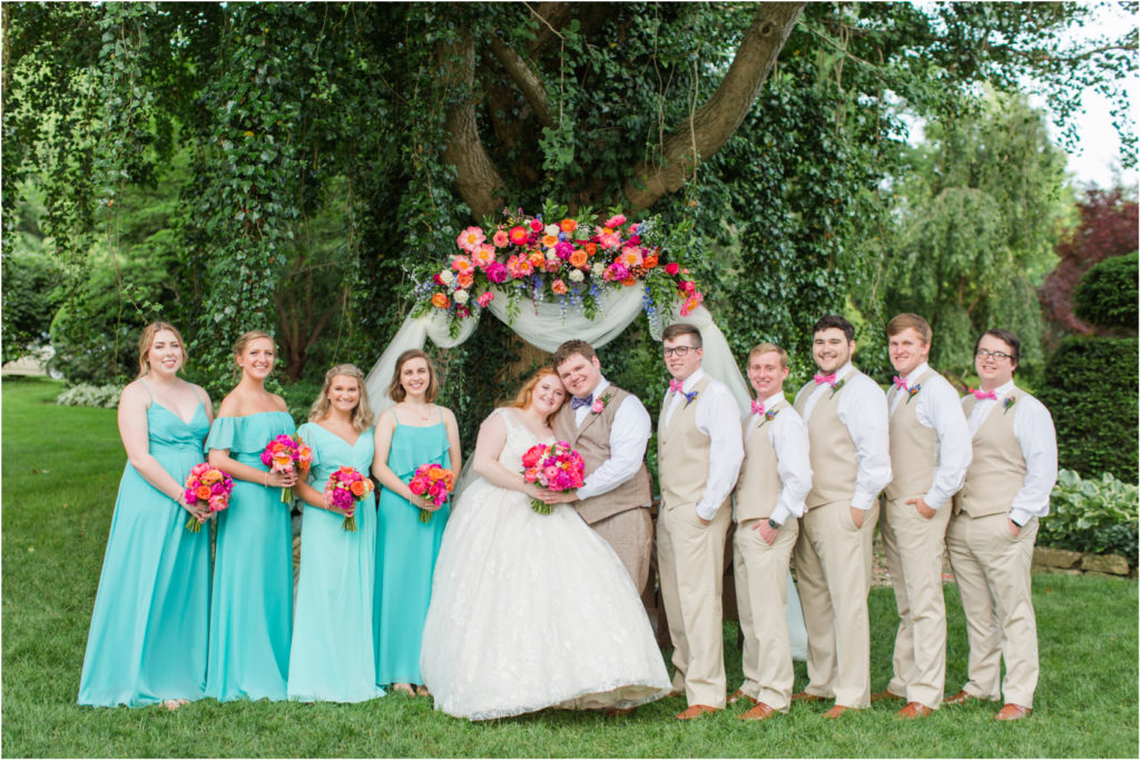 Bridal Party Teal Dresses Peony Bouquets Floral Arch