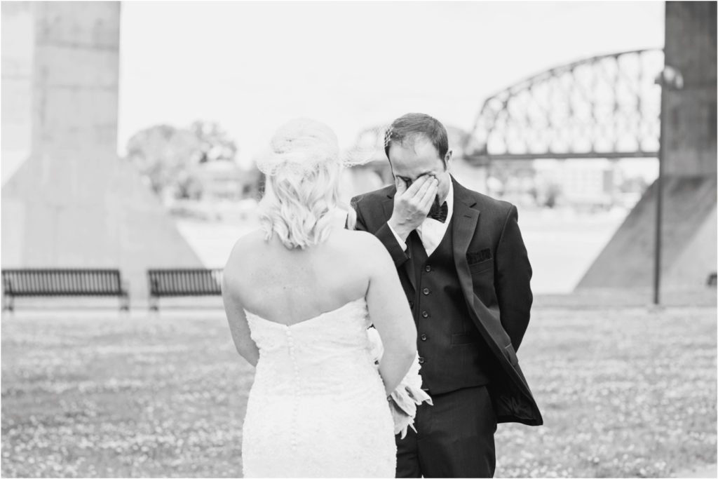 Bride and groom first look Louisville Kentucky waterfront 