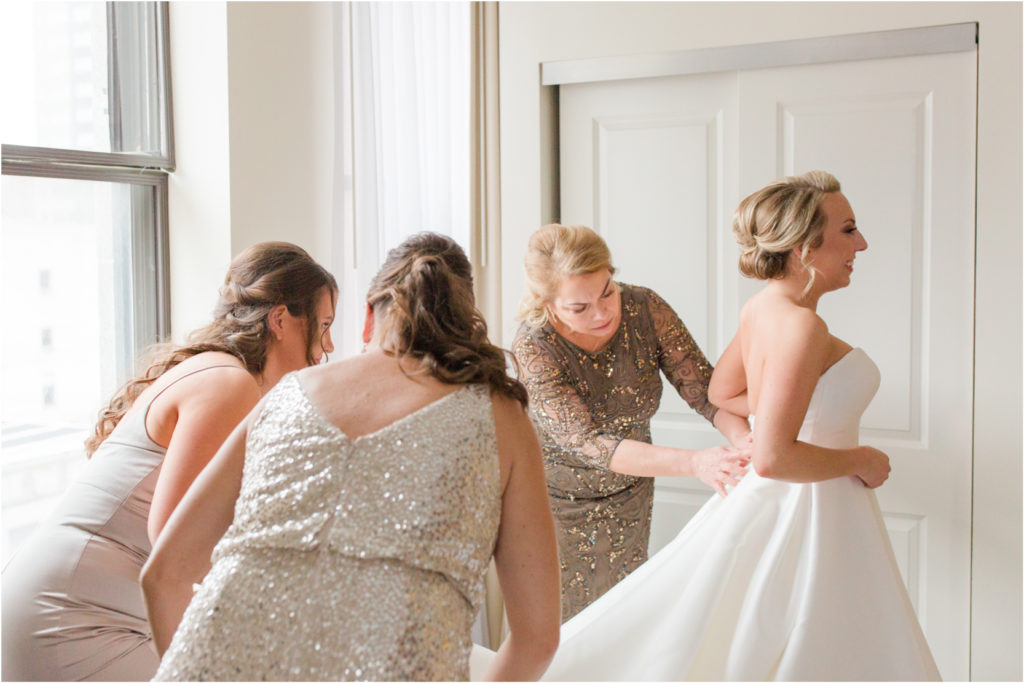 mom helps bride getting ready renaissance hotel columbus ohio