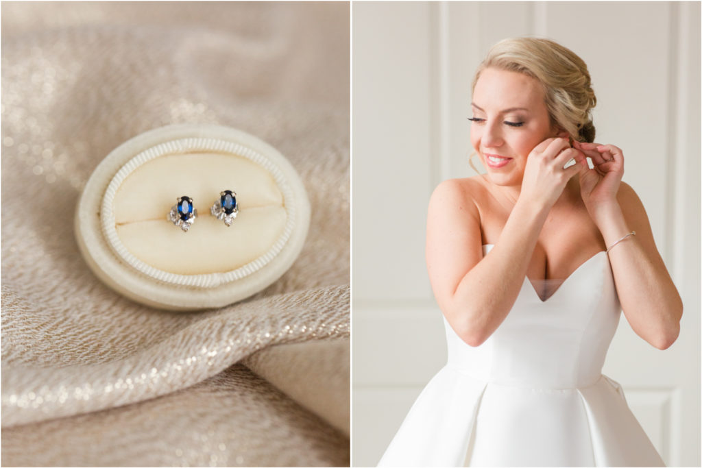 bride putting on her wedding earrings 