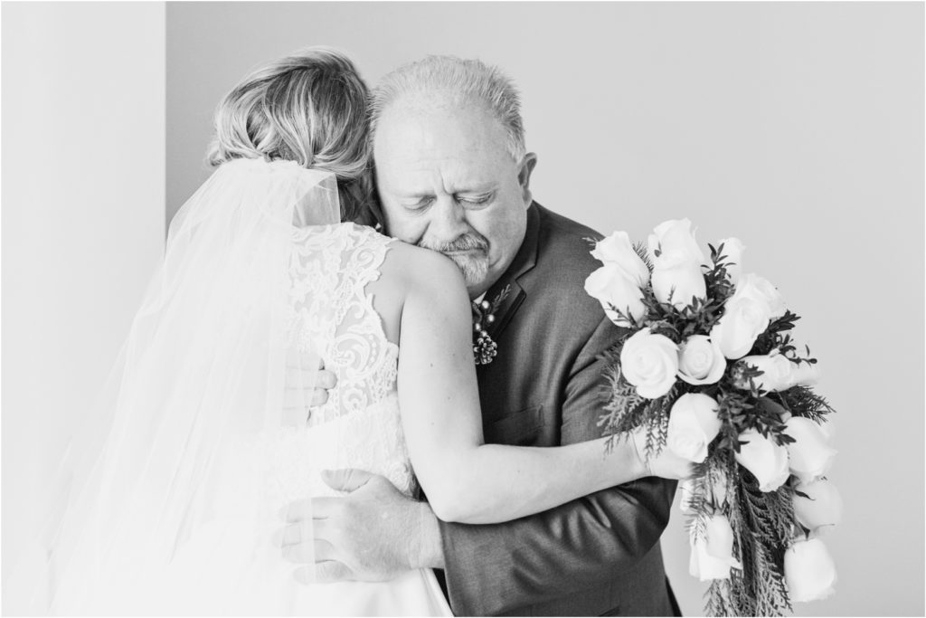 dad cries at first look with daughter on wedding day