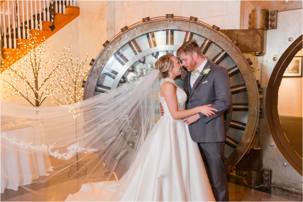 The Vault Gray and Gold New Year's Eve Wedding bride and groom portraits