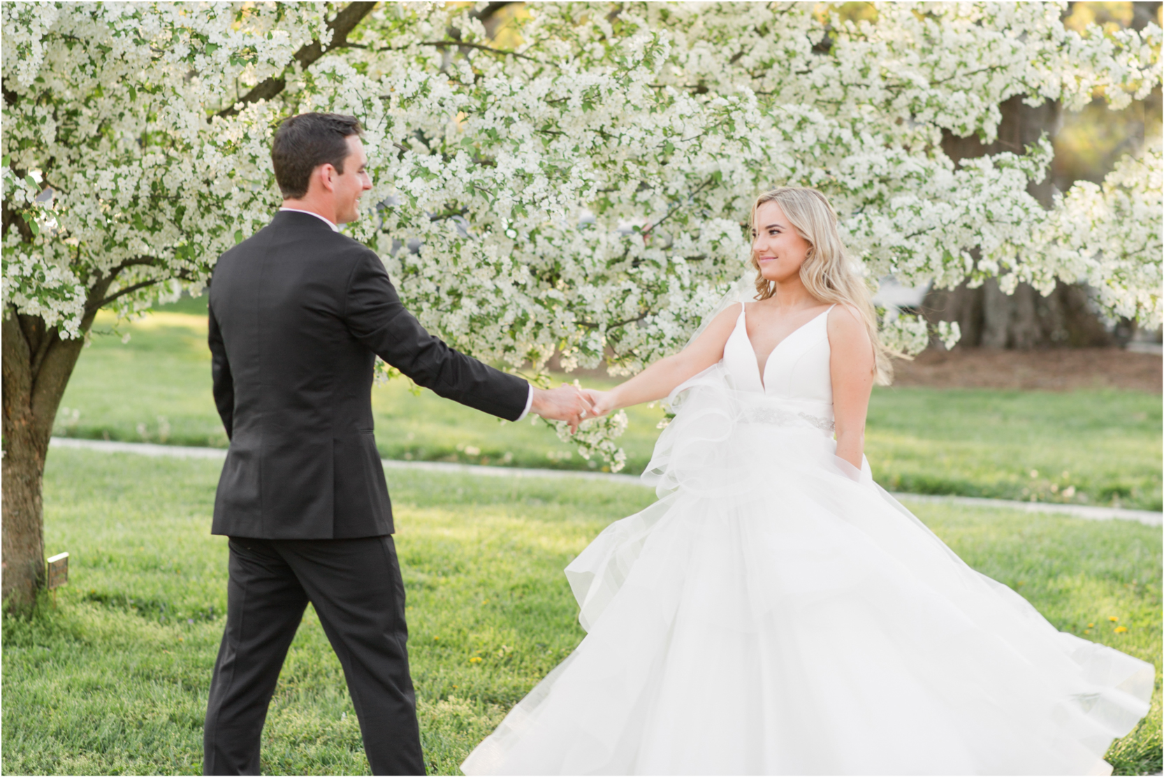 Olmsted Spring Wedding blooming trees Bride and groom portraits Louisville Kentucky